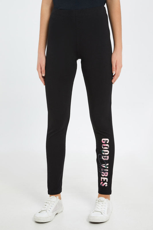 Redtag-Girls-Black-Placement-Print-Legging-Category:Leggings,-Colour:Black,-Deals:New-In,-Dept:Girls,-Filter:Senior-Girls-(8-to-14-Yrs),-GSR-Leggings,-H1:KWR,-H2:GSR,-H3:TRS,-H4:LEG,-New-In-GSR-APL,-Non-Sale,-S23C,-Season:S23D,-Section:Girls-(0-to-14Yrs),-TBL-Senior-Girls-9 to 14 Years