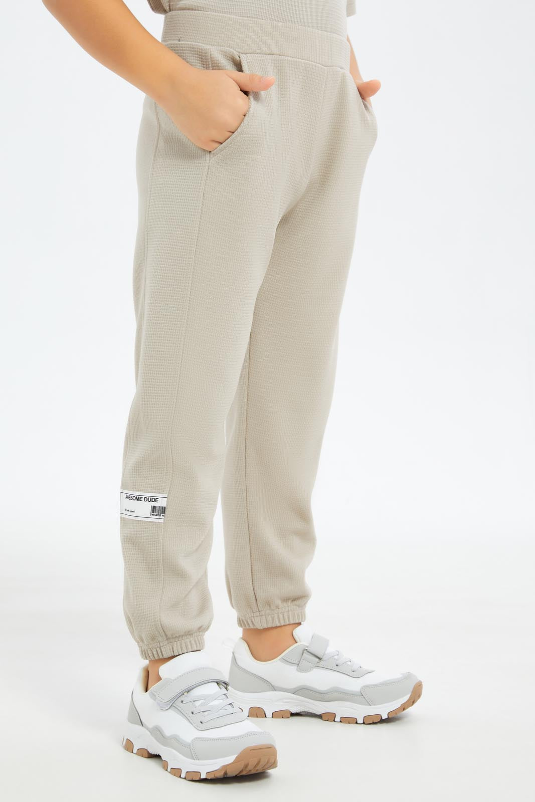 Redtag-Boys-Beige-Pique-Jaquard-Embosed-Track-Pant-BOY-Joggers,-Category:Joggers,-Colour:Beige,-Deals:New-In,-Dept:Boys,-Filter:Boys-(2-to-8-Yrs),-New-In-BOY-APL,-Non-Sale,-S23C,-Section:Boys-(0-to-14Yrs)-Boys-2 to 8 Years