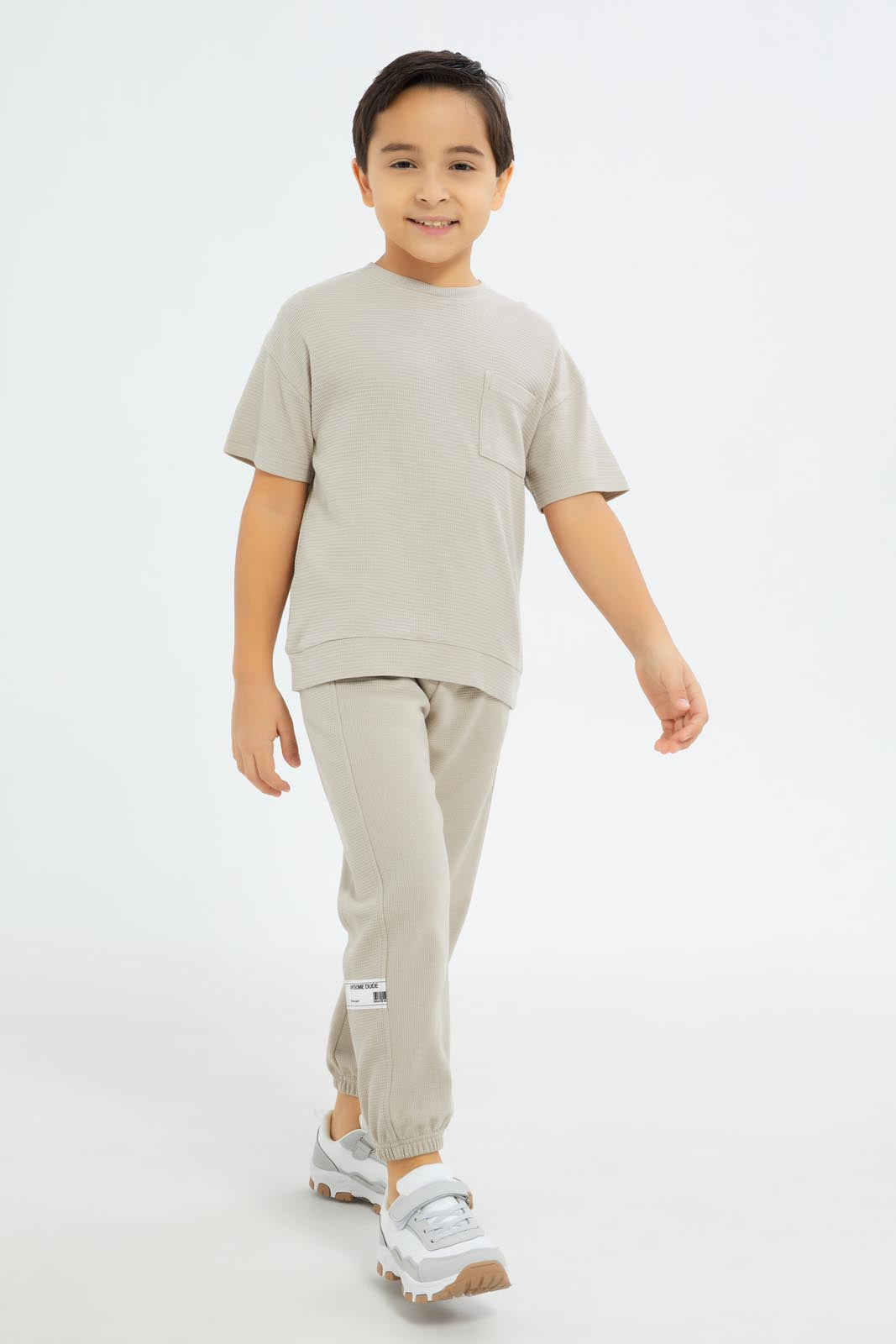 Redtag-Boys-Beige-Pique-Jaquard-Embosed-Track-Pant-BOY-Joggers,-Category:Joggers,-Colour:Beige,-Deals:New-In,-Dept:Boys,-Filter:Boys-(2-to-8-Yrs),-New-In-BOY-APL,-Non-Sale,-S23C,-Section:Boys-(0-to-14Yrs)-Boys-2 to 8 Years