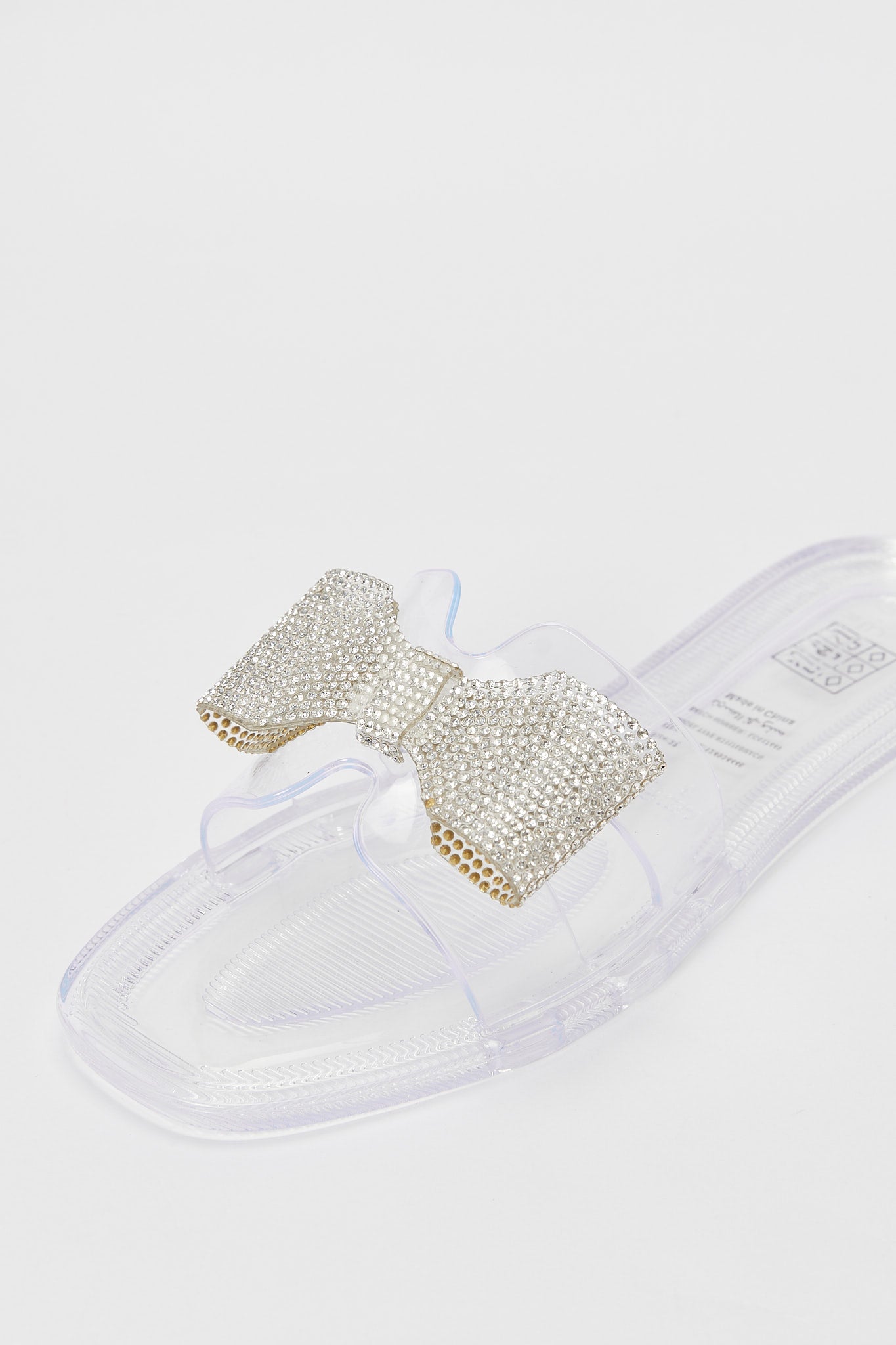 Redtag-Clear-Jelly-With-Diamante-Bow-Trim-Category:Shoes,-Colour:White,-Deals:New-In,-Filter:Women's-Footwear,-H1:FOO,-H2:LAD,-H3:SAF,-H4:FLF,-New-In-Women-FOO,-Non-Sale,-Promo:RMD,-RMD,-S23B,-Season:S23B,-Section:Women,-Women-Flip-Flops-Women's-