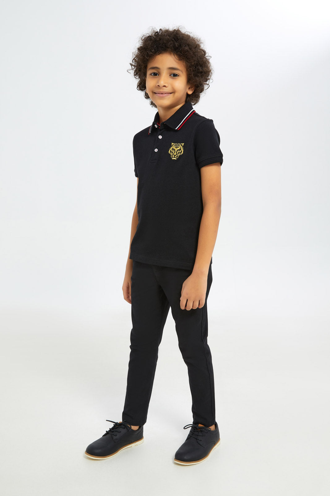 Redtag-Boys-Black-Embroidered-Ramadan-Polo-BOY-Polo-T-Shirts,-Category:Polo-T-Shirts,-Colour:Black,-Deals:New-In,-Dept:Boys,-Filter:Boys-(2-to-8-Yrs),-H1:KWR,-H2:BOY,-H3:TSH,-H4:POS,-New-In-BOY-APL,-Non-Sale,-RMD,-S23C,-Season:S23C,-Section:Boys-(0-to-14Yrs)-Boys-2 to 8 Years