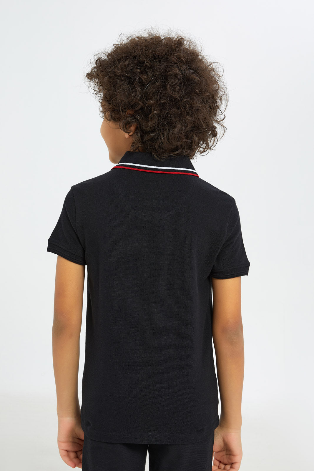 Redtag-Boys-Black-Embroidered-Ramadan-Polo-BOY-Polo-T-Shirts,-Category:Polo-T-Shirts,-Colour:Black,-Deals:New-In,-Dept:Boys,-Filter:Boys-(2-to-8-Yrs),-H1:KWR,-H2:BOY,-H3:TSH,-H4:POS,-New-In-BOY-APL,-Non-Sale,-RMD,-S23C,-Season:S23C,-Section:Boys-(0-to-14Yrs)-Boys-2 to 8 Years