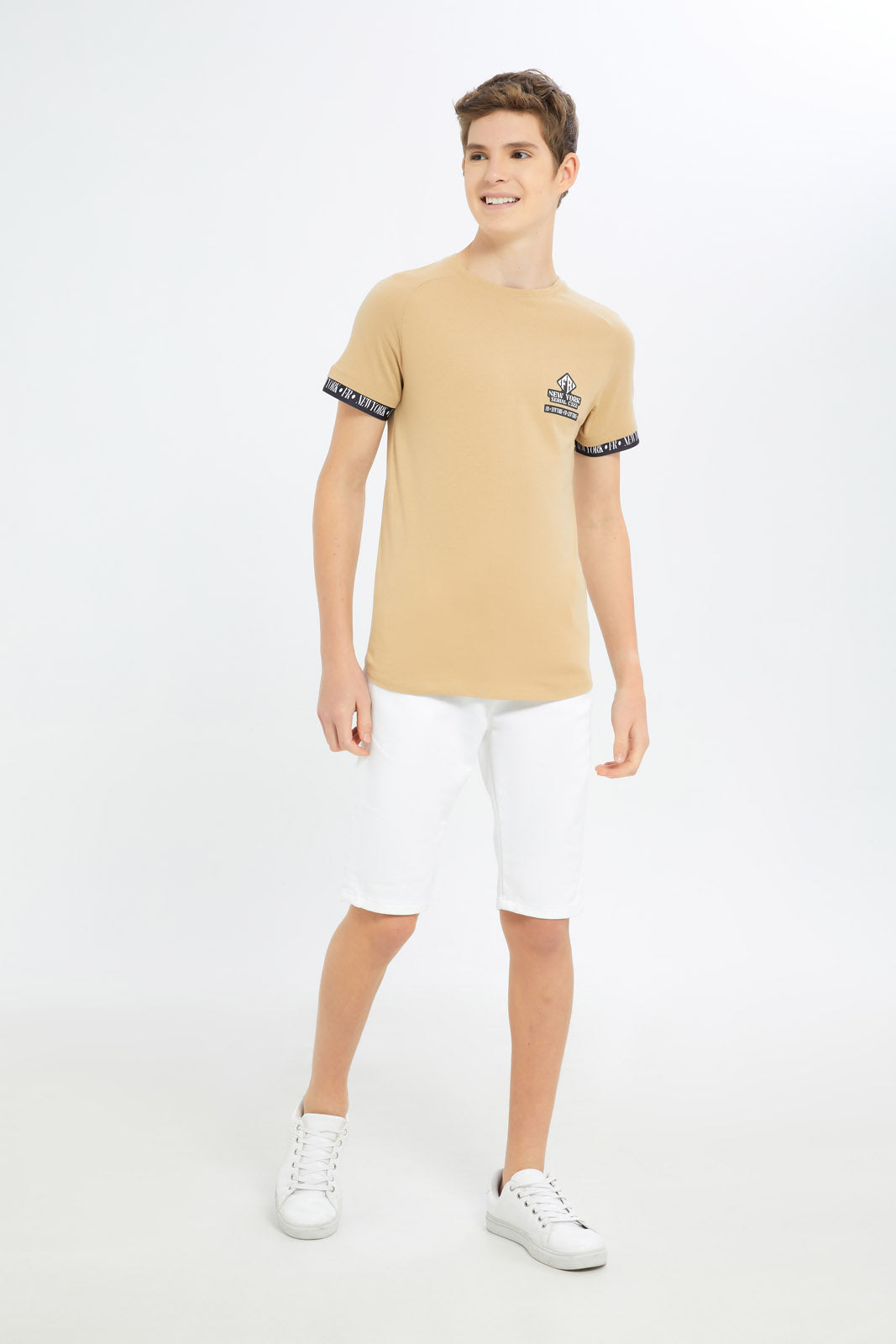 Redtag-Boys-Beige-Tape-On-Sleeve-Cuff-Tee-BSR-T-Shirts,-Category:T-Shirts,-Colour:Beige,-Deals:New-In,-Dept:Boys,-Filter:Senior-Boys-(8-to-14-Yrs),-H1:KWR,-H2:BSR,-H3:TSH,-H4:TSH,-New-In-BSR-APL,-Non-Sale,-S23C,-Season:S23C,-Section:Boys-(0-to-14Yrs)-Senior-Boys-9 to 14 Years