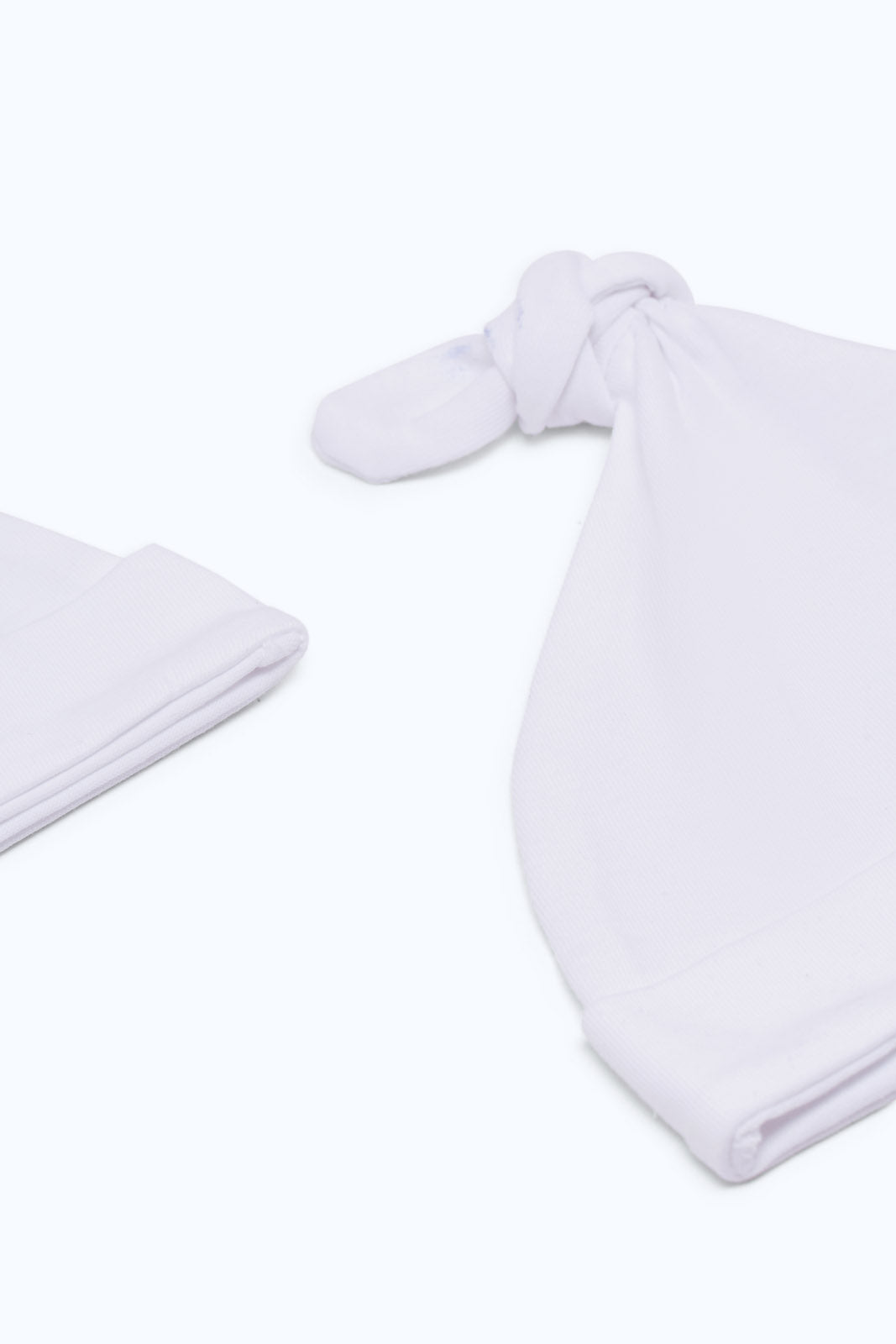 Redtag-White-2-Piece-Hat-Category:Newborn-Accessories,-Colour:White,-Deals:New-In,-Dept:New-Born,-Filter:Baby-(0-to-12-Mths),-H1:KWR,-H2:NBF,-H3:ACC,-H4:HAT,-NBF-Newborn-Accessories,-New-In-NBF-APL,-Non-Sale,-PPE,-S23C,-Season:S23C,-Section:Boys-(0-to-14Yrs)-Baby-0 to 12 Months