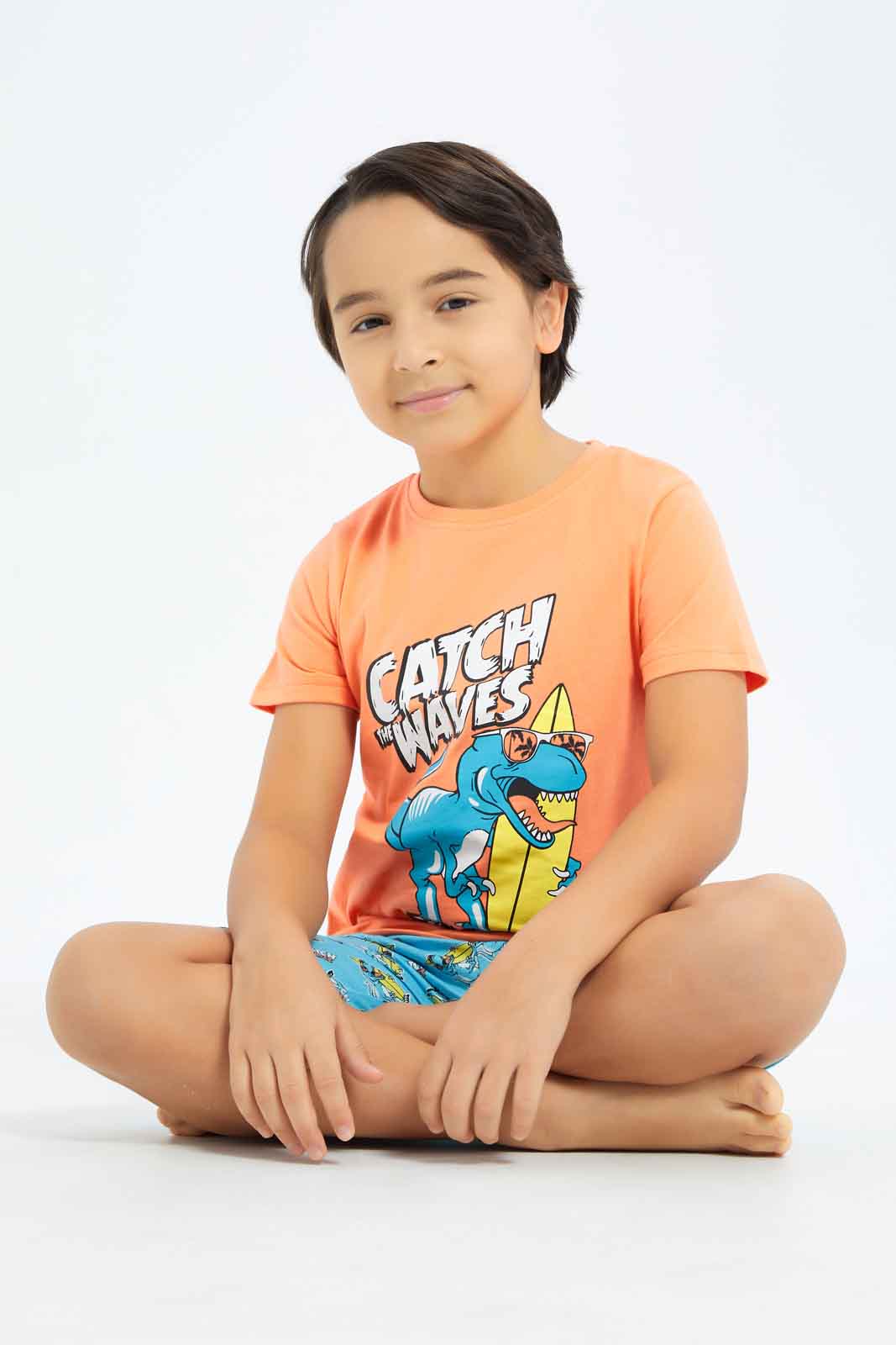 Redtag-Boys-Coral-Dino-Short-Sleeve-Tee-And-Shorts-Pyjama-Set-BOY-Pyjama-Sets,-Category:Pyjama-Sets,-Colour:Red,-Deals:New-In,-Dept:Boys,-Filter:Boys-(2-to-8-Yrs),-New-In-BOY-APL,-Non-Sale,-S23C,-Section:Boys-(0-to-14Yrs),-VLM-Boys-2 to 8 Years