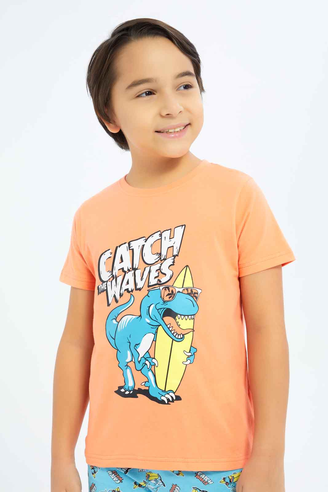 Redtag-Boys-Coral-Dino-Short-Sleeve-Tee-And-Shorts-Pyjama-Set-BOY-Pyjama-Sets,-Category:Pyjama-Sets,-Colour:Red,-Deals:New-In,-Dept:Boys,-Filter:Boys-(2-to-8-Yrs),-New-In-BOY-APL,-Non-Sale,-S23C,-Section:Boys-(0-to-14Yrs),-VLM-Boys-2 to 8 Years