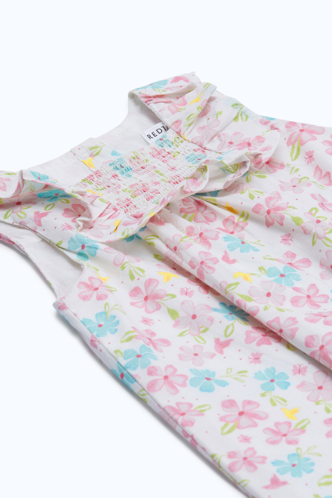 Redtag-Girls-White-All-Over-Floral-Print-Dress-Category:Dresses,-Colour:White,-Deals:New-In,-Dept:Girls,-Filter:Infant-Girls-(3-to-24-Mths),-H1:KWR,-H2:ING,-H3:DRS,-H4:CAD,-ING-Dresses,-New-In-ING-APL,-Non-Sale,-RMD,-S23C,-Season:S23C,-Section:Girls-(0-to-14Yrs)-Infant-Girls-3 to 24 Months