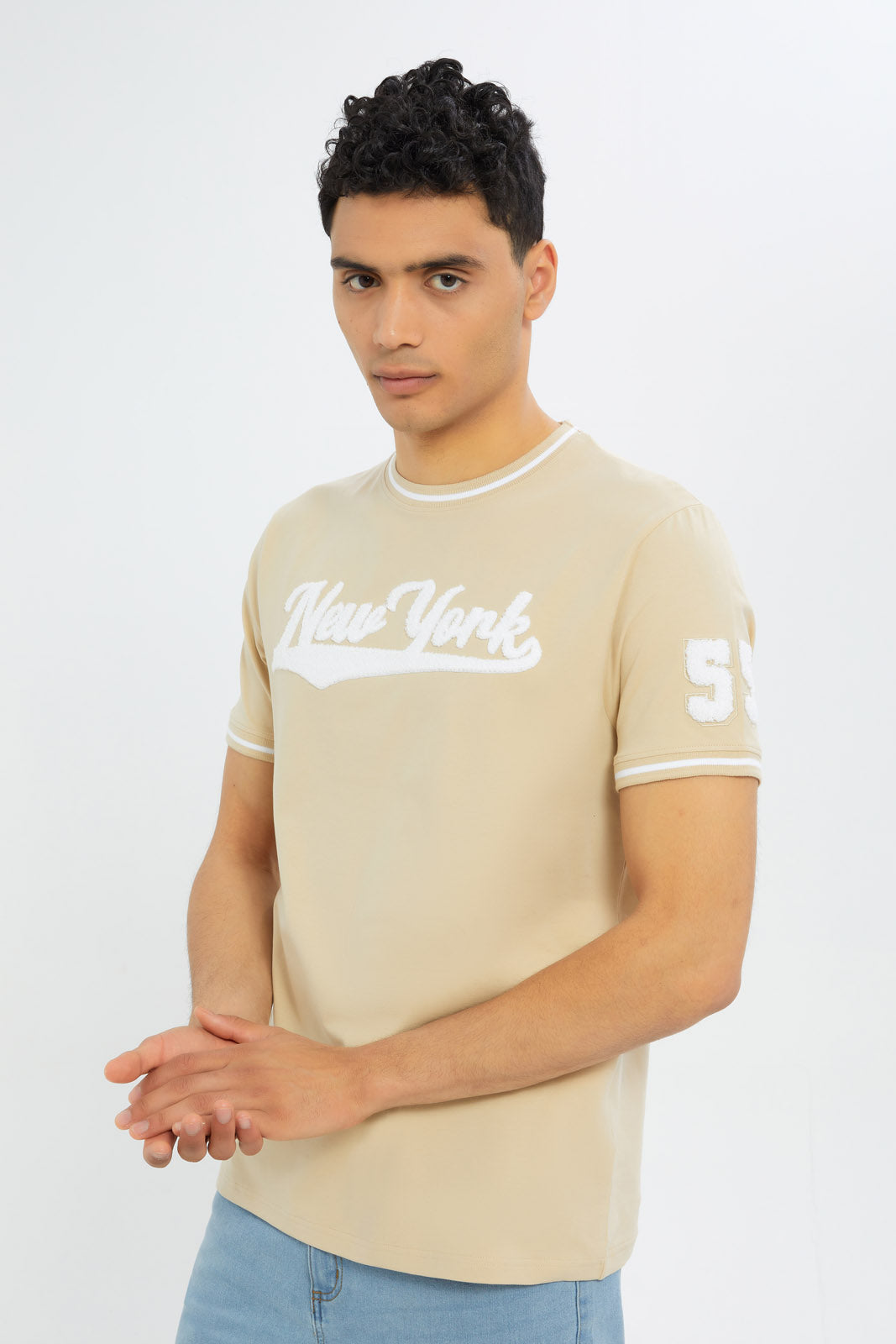 Redtag-Men-Beige-Varsity-T-Shirt-With-Applique-Category:T-Shirts,-Colour:Beige,-Deals:New-In,-Filter:Men's-Clothing,-H1:MWR,-H2:GEN,-H3:TSH,-H4:TSH,-Men-T-Shirts,-New-In-Men-APL,-Non-Sale,-S23C,-Season:S23C,-Section:Men-Men's-