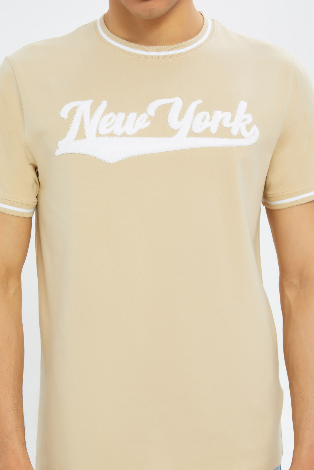 Redtag-Men-Beige-Varsity-T-Shirt-With-Applique-Category:T-Shirts,-Colour:Beige,-Deals:New-In,-Filter:Men's-Clothing,-H1:MWR,-H2:GEN,-H3:TSH,-H4:TSH,-Men-T-Shirts,-New-In-Men-APL,-Non-Sale,-S23C,-Season:S23C,-Section:Men-Men's-