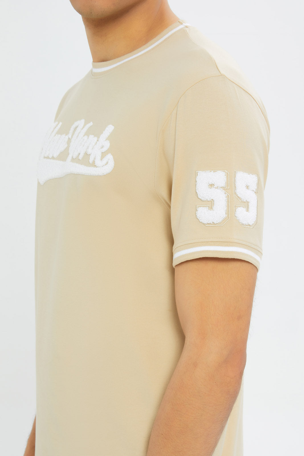 Redtag-Men-Beige-Varsity-T-Shirt-With-Applique-Category:T-Shirts,-Colour:Beige,-Deals:New-In,-Filter:Men's-Clothing,-H1:MWR,-H2:GEN,-H3:TSH,-H4:TSH,-Men-T-Shirts,-New-In-Men-APL,-Non-Sale,-S23C,-Season:S23C,-Section:Men-Men's-