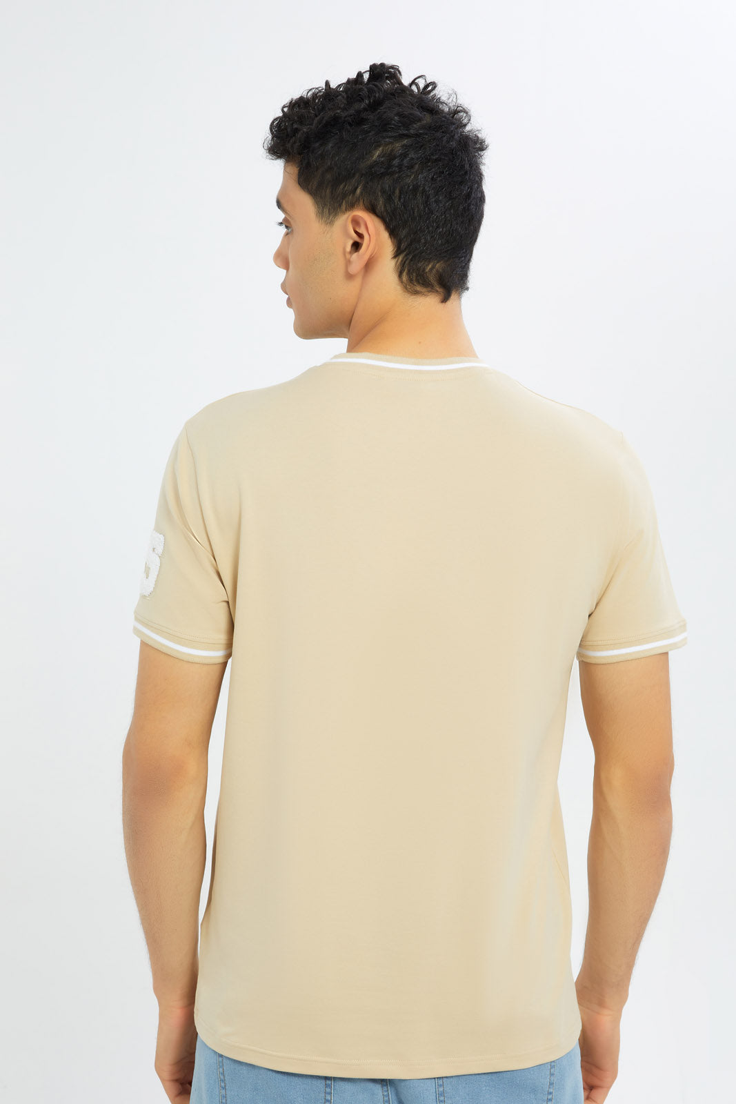 Redtag-Men-Beige-Varsity-T-Shirt-With-Applique-Category:T-Shirts,-Colour:Beige,-Deals:New-In,-Filter:Men's-Clothing,-H1:MWR,-H2:GEN,-H3:TSH,-H4:TSH,-Men-T-Shirts,-New-In-Men-APL,-Non-Sale,-S23C,-Season:S23C,-Section:Men-Men's-