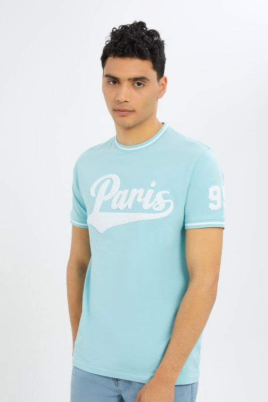 Redtag-Men-Sky-Blue-Varsity-T-Shirt-With-Applique-Category:T-Shirts,-Colour:Sky-Blue,-Deals:New-In,-Filter:Men's-Clothing,-H1:MWR,-H2:GEN,-H3:TSH,-H4:TSH,-Men-T-Shirts,-New-In-Men-APL,-Non-Sale,-S23C,-Season:S23C,-Section:Men-Men's-
