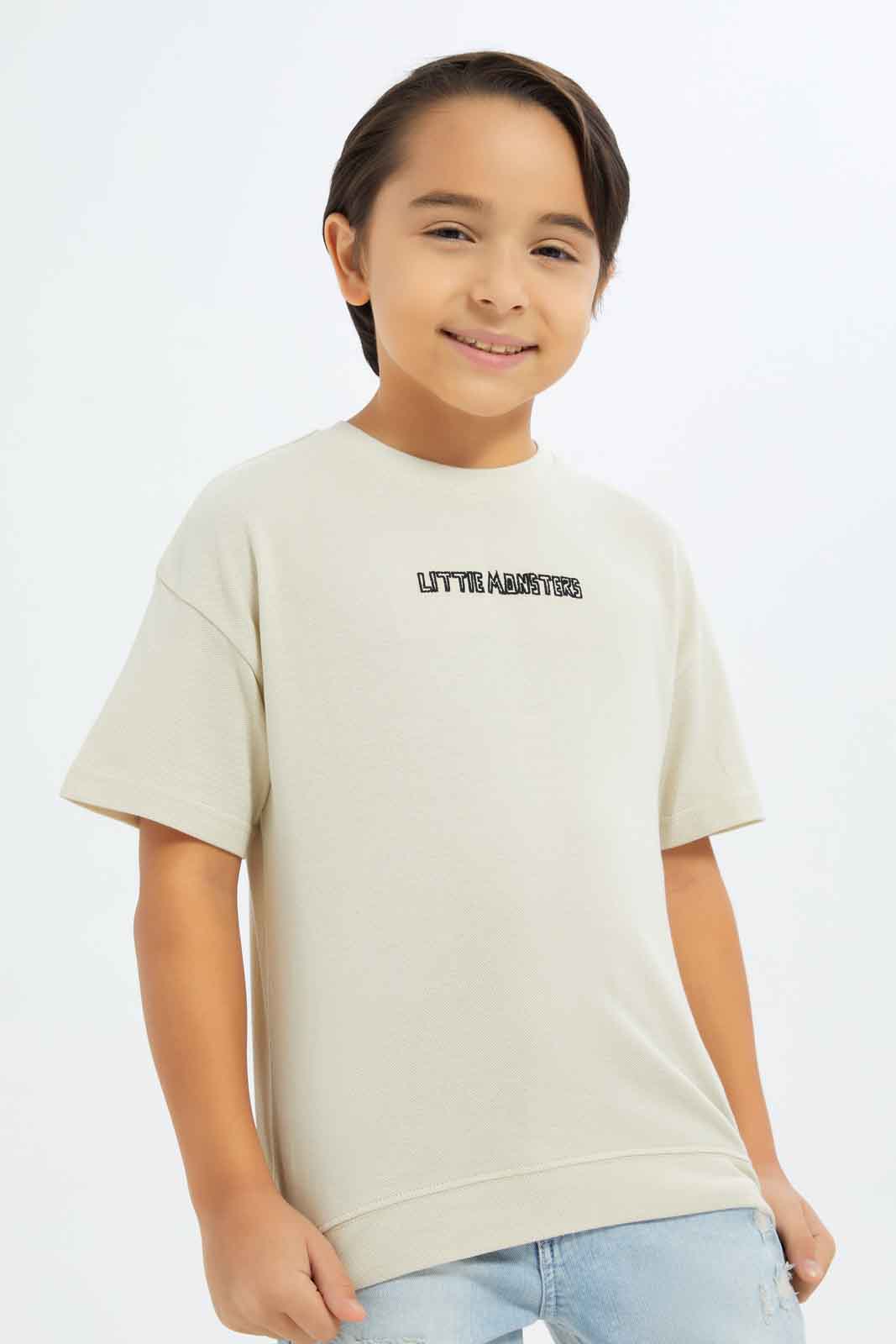Redtag-Boys-Beige-Embroidered-Short-Sleeve-Oversize-Pique-T-Shirt-BOY-T-Shirts,-Category:T-Shirts,-Colour:Beige,-Deals:New-In,-Filter:Boys-(2-to-8-Yrs),-New-In-BOY-APL,-Non-Sale,-S23C,-Section:Boys-(0-to-14Yrs),-TBL-Boys-2 to 8 Years
