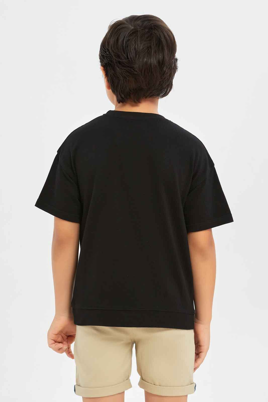 Redtag-Boys-Black-Embroidered-Short-Sleeve-Oversize-Pique-T-Shirt-BOY-T-Shirts,-Category:T-Shirts,-Colour:Black,-Deals:New-In,-Filter:Boys-(2-to-8-Yrs),-New-In-BOY-APL,-Non-Sale,-S23C,-Section:Boys-(0-to-14Yrs),-TBL-Boys-2 to 8 Years