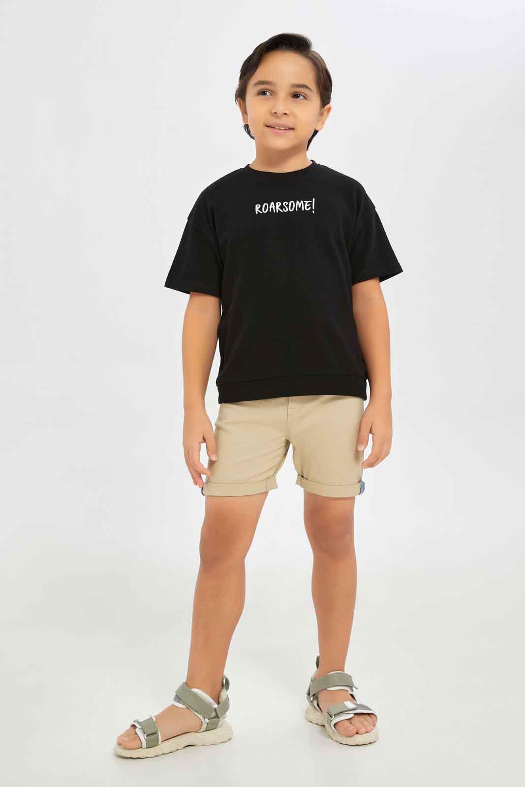 Redtag-Boys-Black-Embroidered-Short-Sleeve-Oversize-Pique-T-Shirt-BOY-T-Shirts,-Category:T-Shirts,-Colour:Black,-Deals:New-In,-Filter:Boys-(2-to-8-Yrs),-New-In-BOY-APL,-Non-Sale,-S23C,-Section:Boys-(0-to-14Yrs),-TBL-Boys-2 to 8 Years