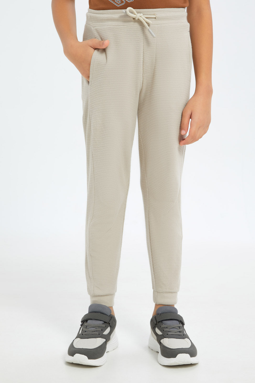 Redtag-Boys-Beige-Waffle-Jogpant-BOY-Joggers,-Category:Joggers,-Colour:Beige,-Deals:New-In,-Filter:Boys-(2-to-8-Yrs),-New-In-BOY-APL,-Non-Sale,-S23C,-Section:Boys-(0-to-14Yrs)-Boys-2 to 8 Years