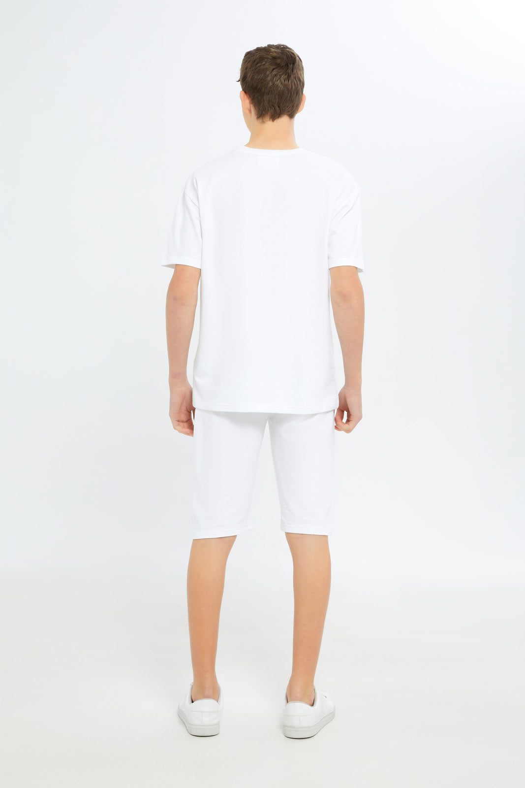 Redtag-Boys-White-Club-Monde-Oversize-Casual-Set-BSR-Casual-Sets,-Category:Casual-Sets,-Colour:White,-Deals:New-In,-Filter:Senior-Boys-(8-to-14-Yrs),-H1:KWR,-H2:BSR,-H3:SET,-H4:CAE,-New-In-BSR-APL,-Non-Sale,-S23C,-Season:S23C,-Section:Boys-(0-to-14Yrs)--