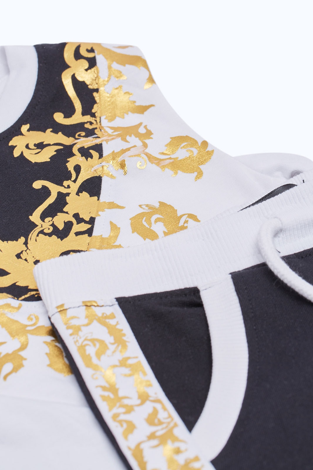 Redtag-Boys-Black-And-White-With-Gold-Design-Print-Tshirt-And-Short-Set-(2-Pack)-Category:Sets,-Colour:White,-Deals:New-In,-Event:,-Filter:Infant-Boys-(3-to-24-Mths),-H1:KWR,-H2:INB,-H3:SET,-H4:CAE,-INB-Sets,-New-In-INB-APL,-Non-Sale,-Packs,-Promo:,-RMD,-S23C,-Season:S23C,-Section:Boys-(0-to-14Yrs),-Set:Set-of-2-Infant-Boys-3 to 24 Months