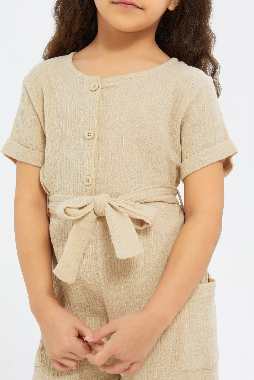 Redtag-Girls-Beige-Dobby-Playsuit-Category:Jumpsuits,-Colour:Beige,-Deals:New-In,-Filter:Girls-(2-to-8-Yrs),-GIR-Jumpsuits,-H1:KWR,-H2:GIR,-H3:SET,-H4:JMS,-New-In-GIR-APL,-Non-Sale,-S23B,-Season:S23B,-Section:Girls-(0-to-14Yrs)-Girls-2 to 8 Years