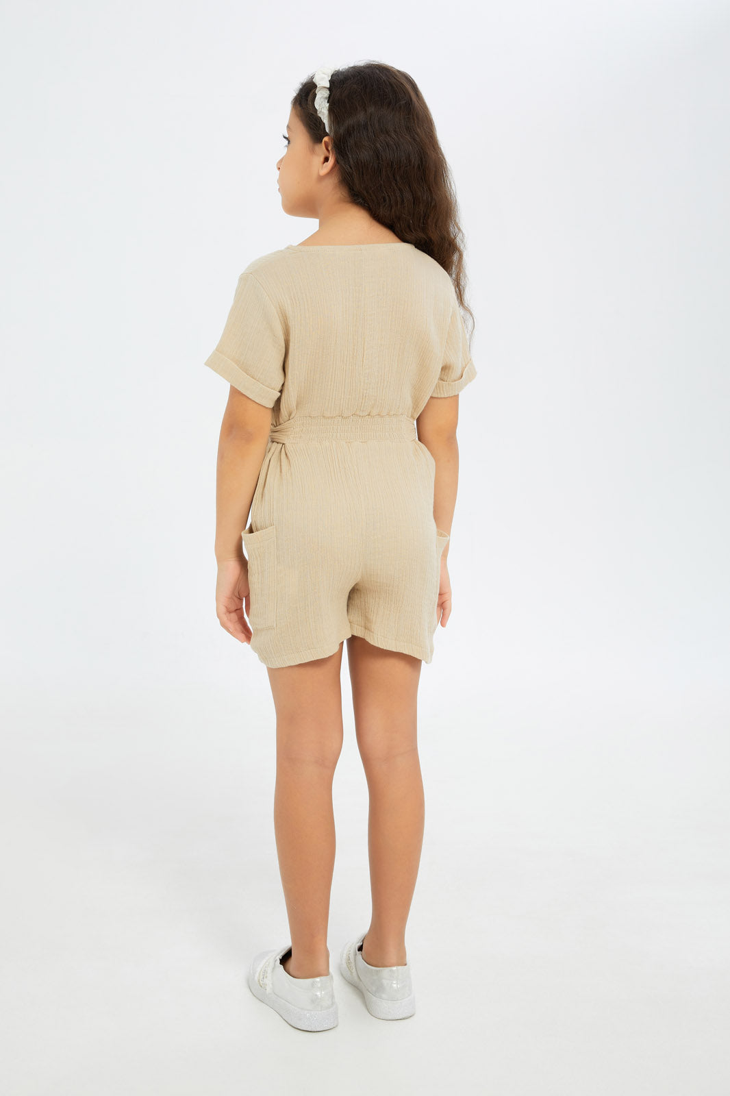 Redtag-Girls-Beige-Dobby-Playsuit-Category:Jumpsuits,-Colour:Beige,-Deals:New-In,-Filter:Girls-(2-to-8-Yrs),-GIR-Jumpsuits,-H1:KWR,-H2:GIR,-H3:SET,-H4:JMS,-New-In-GIR-APL,-Non-Sale,-S23B,-Season:S23B,-Section:Girls-(0-to-14Yrs)-Girls-2 to 8 Years