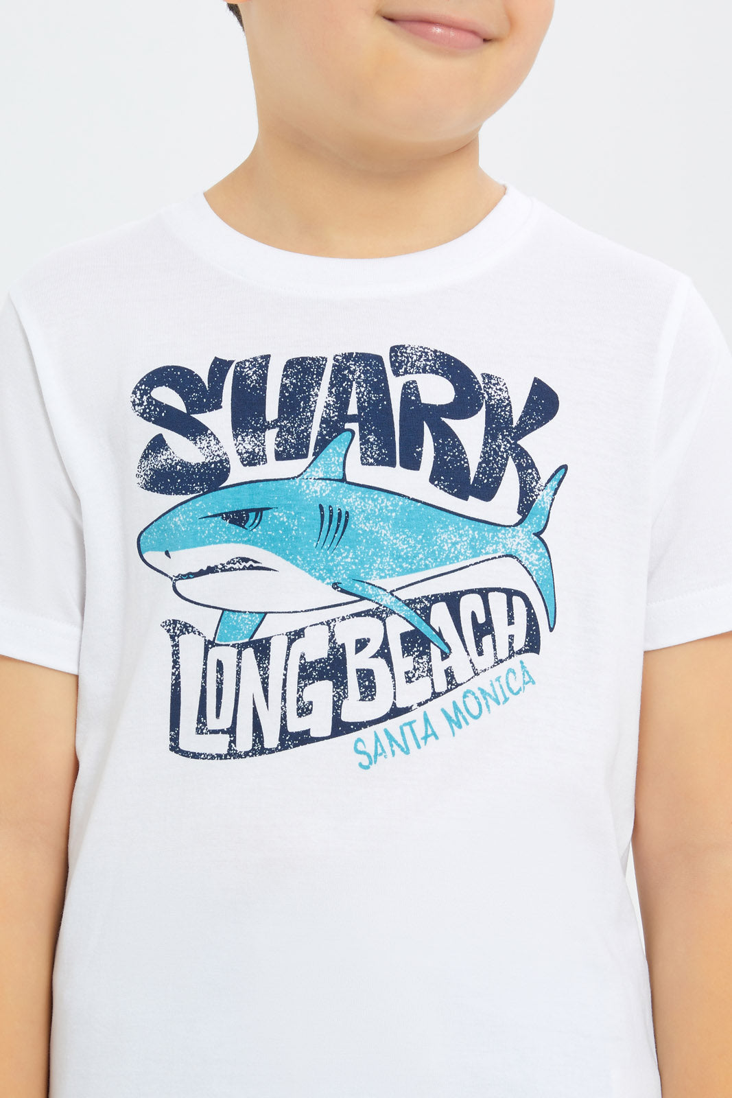 Redtag-Boys-White-Shark-Print-Short-Sleeve-T-Shirt-BOY-T-Shirts,-Category:T-Shirts,-Colour:White,-Deals:New-In,-Filter:Boys-(2-to-8-Yrs),-H1:KWR,-H2:BOY,-H3:TSH,-H4:TSH,-New-In-BOY-APL,-Non-Sale,-Promo:TBL,-S23C,-Season:S23C,-Section:Boys-(0-to-14Yrs),-TBL-Boys-2 to 8 Years