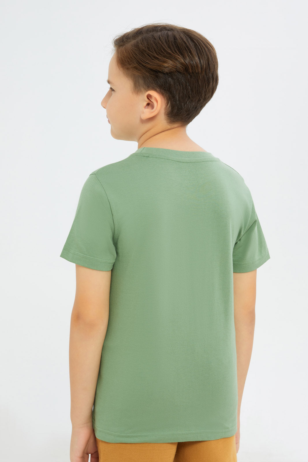 Redtag-Boys-Green-Dino-Print-Short-Sleeve-T-Shirt-BOY-T-Shirts,-Category:T-Shirts,-Colour:Green,-Deals:New-In,-Filter:Boys-(2-to-8-Yrs),-H1:KWR,-H2:BOY,-H3:TSH,-H4:TSH,-New-In-BOY-APL,-Non-Sale,-Promo:TBL,-S23C,-Season:S23C,-Section:Boys-(0-to-14Yrs),-TBL-Boys-2 to 8 Years