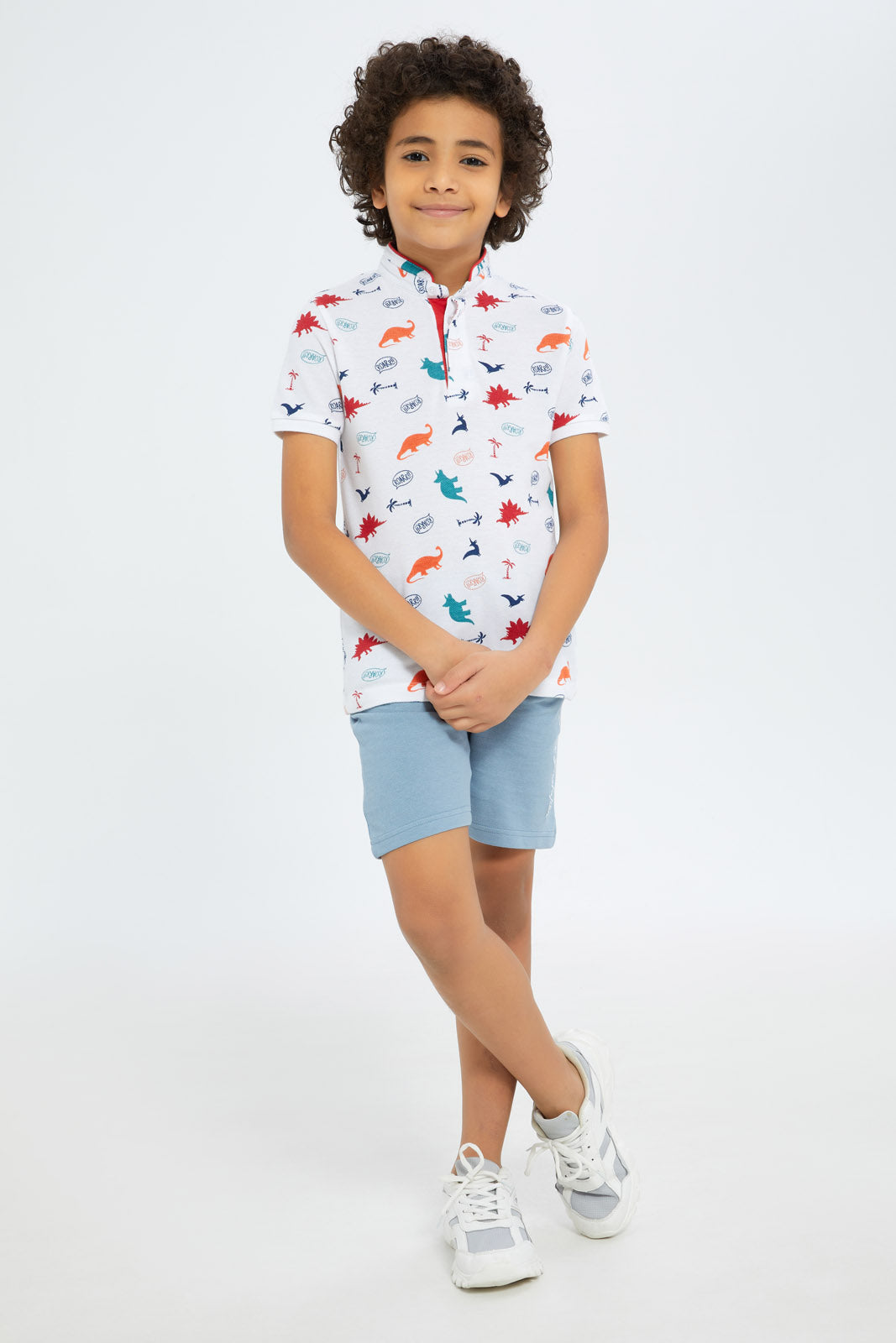 Redtag-Boys-White-Dino-Allover-Print-Stand-Up-Collar-Polo-Shirt-BOY-Polo-T-Shirts,-Category:Polo-T-Shirts,-Colour:White,-Deals:New-In,-Filter:Boys-(2-to-8-Yrs),-New-In-BOY-APL,-Non-Sale,-S23C,-Section:Boys-(0-to-14Yrs),-TBL-Boys-2 to 8 Years