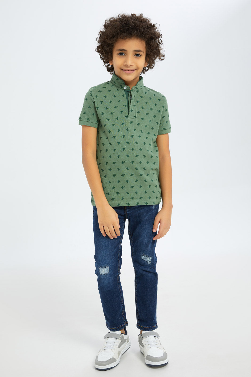 Redtag-Boys-Green-Cactus-Allover-Print-Stand-Up-Collar-Polo-Shirt-BOY-Polo-T-Shirts,-Category:Polo-T-Shirts,-Colour:Green,-Deals:New-In,-Filter:Boys-(2-to-8-Yrs),-New-In-BOY-APL,-Non-Sale,-S23C,-Section:Boys-(0-to-14Yrs),-TBL-Boys-2 to 8 Years