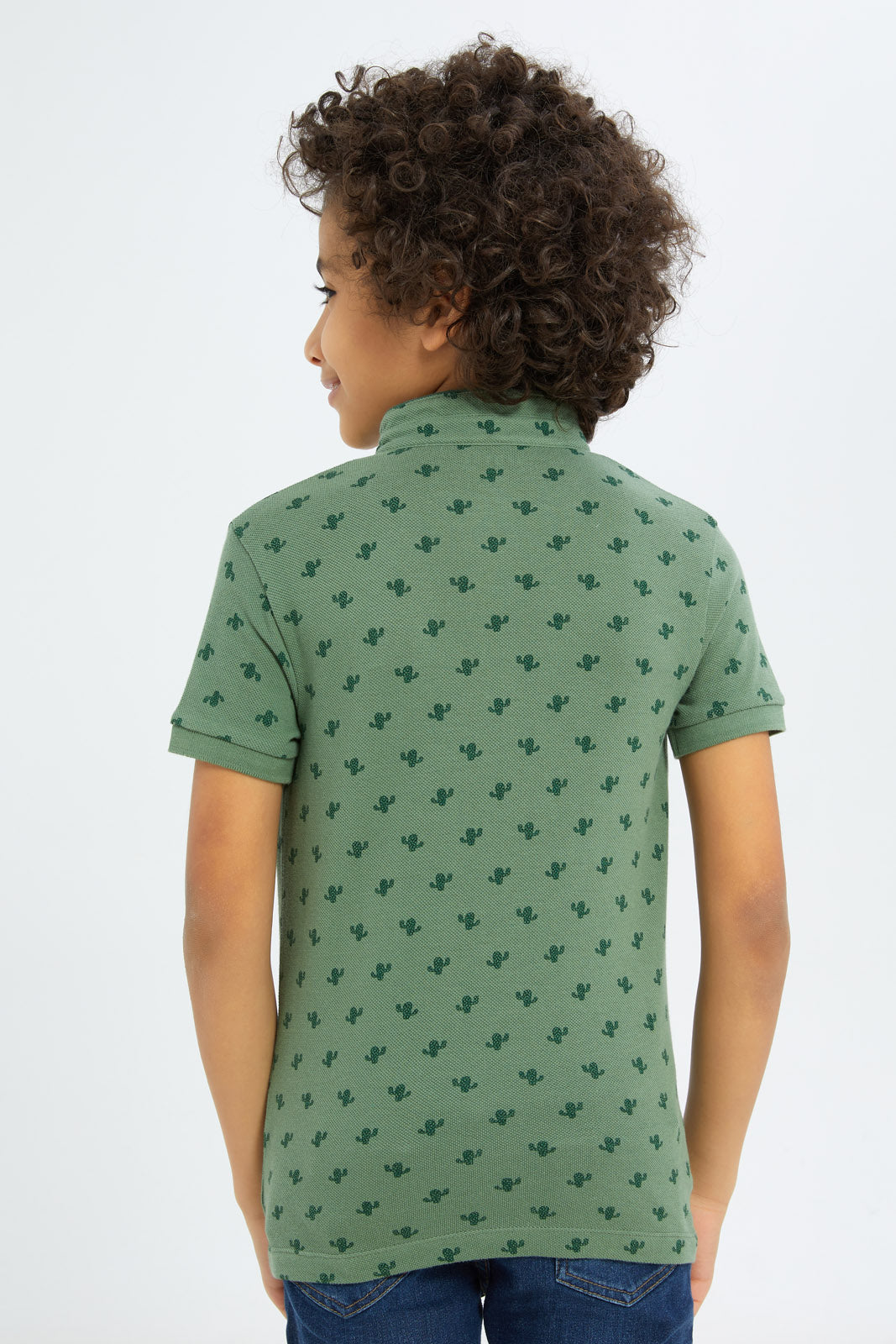 Redtag-Boys-Green-Cactus-Allover-Print-Stand-Up-Collar-Polo-Shirt-BOY-Polo-T-Shirts,-Category:Polo-T-Shirts,-Colour:Green,-Deals:New-In,-Filter:Boys-(2-to-8-Yrs),-New-In-BOY-APL,-Non-Sale,-S23C,-Section:Boys-(0-to-14Yrs),-TBL-Boys-2 to 8 Years