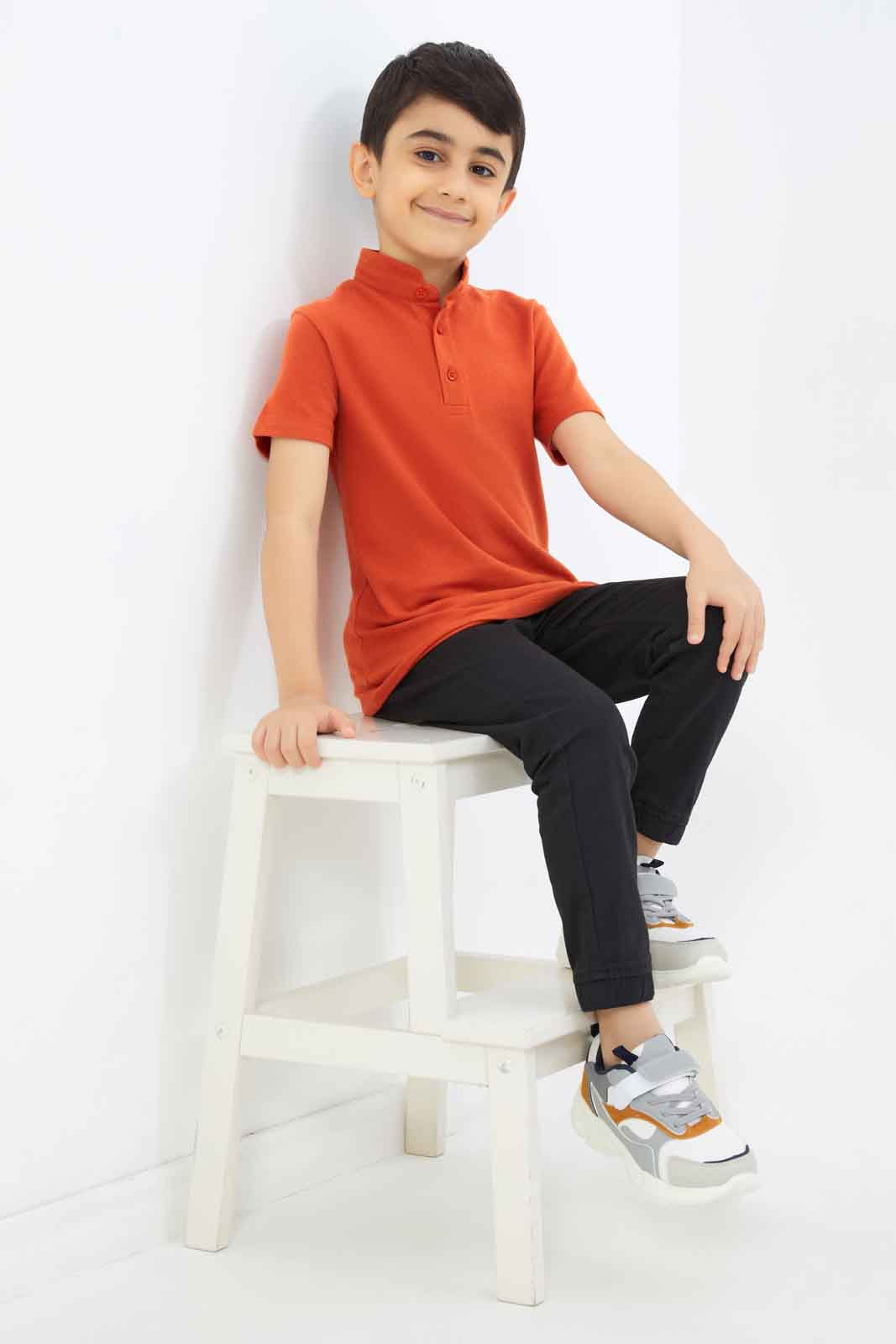Redtag-Boys-Orange-Collar-Stand-Polo-BOY-Polo-T-Shirts,-Category:Polo-T-Shirts,-Colour:Orange,-Deals:New-In,-Filter:Boys-(2-to-8-Yrs),-New-In-BOY-APL,-Non-Sale,-S23C,-Section:Boys-(0-to-14Yrs),-VLM-Boys-2 to 8 Years