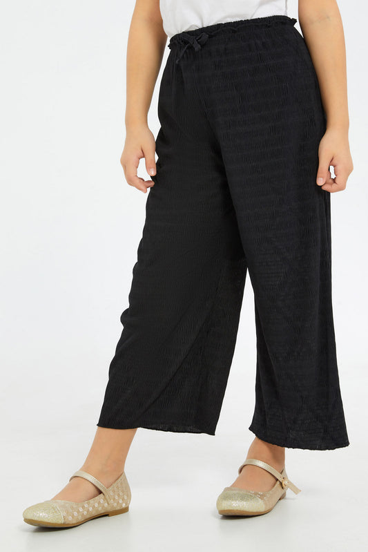 Redtag-Girls-Black-Crinkled-Trouser-Category:Trousers,-Colour:Black,-Deals:New-In,-Filter:Girls-(2-to-8-Yrs),-GIR-Trousers,-H1:KWR,-H2:GIR,-H3:TRS,-H4:CTR,-New-In-GIR-APL,-Non-Sale,-S23B,-Season:S23B,-Section:Girls-(0-to-14Yrs)-Girls-2 to 8 Years