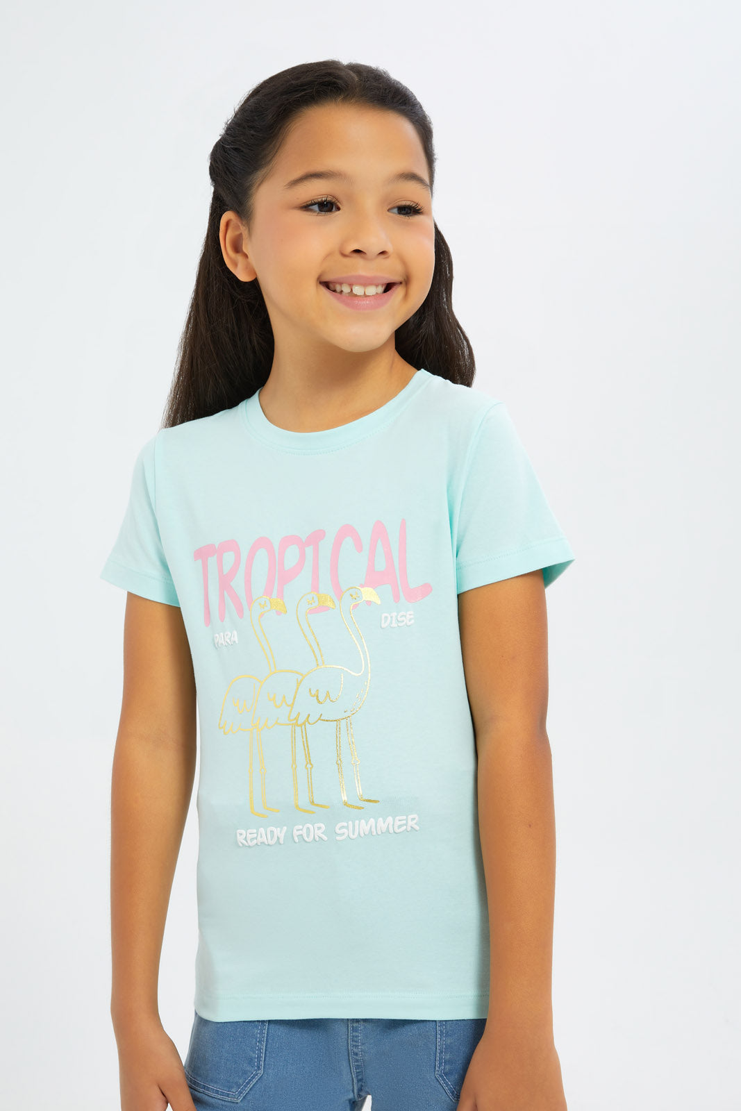 Redtag-Girls-Blue-"Tropical"-Foil-Print-Tshirt-Category:T-Shirts,-Colour:Blue,-Deals:New-In,-Filter:Girls-(2-to-8-Yrs),-GIR-T-Shirts,-H1:KWR,-H2:GIR,-H3:TSH,-H4:CAT,-New-In-GIR-APL,-Non-Sale,-S23C,-Season:S23C,-Section:Girls-(0-to-14Yrs),-TBL-Girls-2 to 8 Years