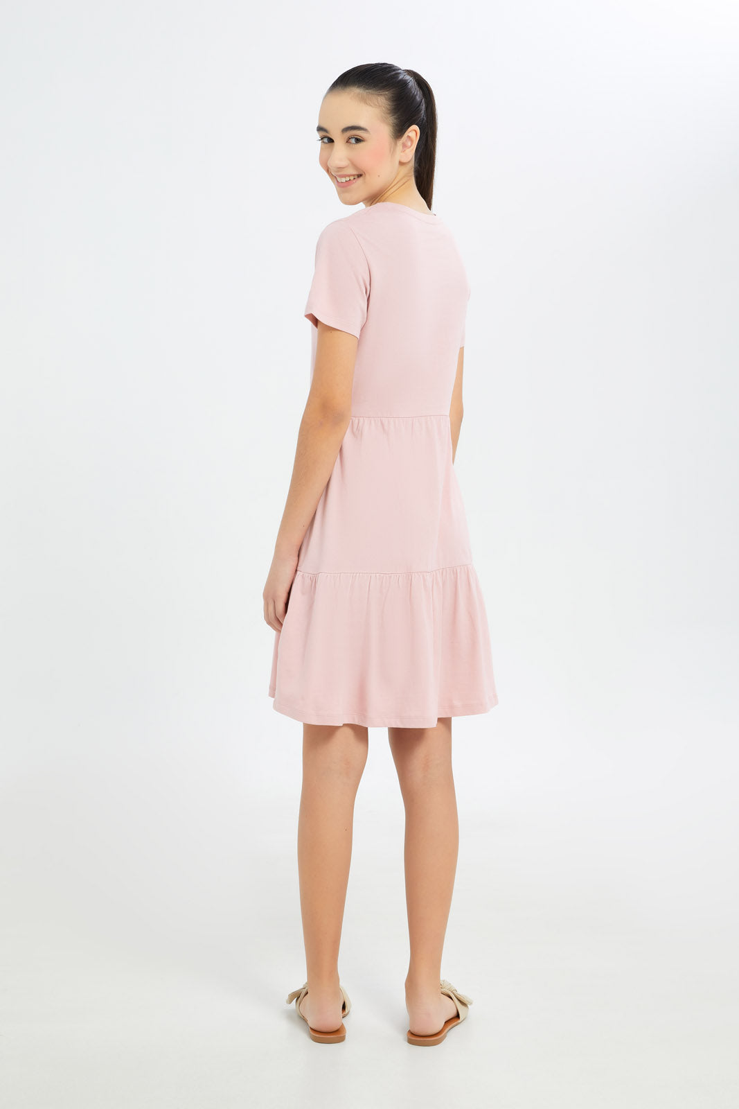 Redtag-Girls-Pink-Tiered-Dress-Category:Dresses,-Colour:Apricot,-Deals:New-In,-Dress-Size:Short-Dress,-Event:STRATEGY,-Filter:Senior-Girls-(8-to-14-Yrs),-GSR-Dresses,-H1:KWR,-H2:GSR,-H3:DRS,-H4:CAD,-New-In-GSR-APL,-Non-Sale,-Promo:PPE,-S23B,-Season:S23B,-Section:Girls-(0-to-14Yrs)-Senior-Girls-9 to 14 Years
