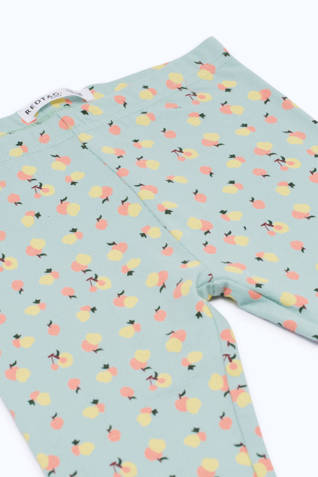 Redtag-Girls-Sage-Fruit-Aop-Legging-Category:Leggings,-Colour:Green,-Deals:New-In,-Filter:Infant-Girls-(3-to-24-Mths),-H1:KWR,-H2:ING,-H3:TRS,-H4:LEG,-ING-Leggings,-New-In-ING-APL,-Non-Sale,-S23C,-Season:S23C,-Section:Girls-(0-to-14Yrs)-Infant-Girls-3 to 24 Months