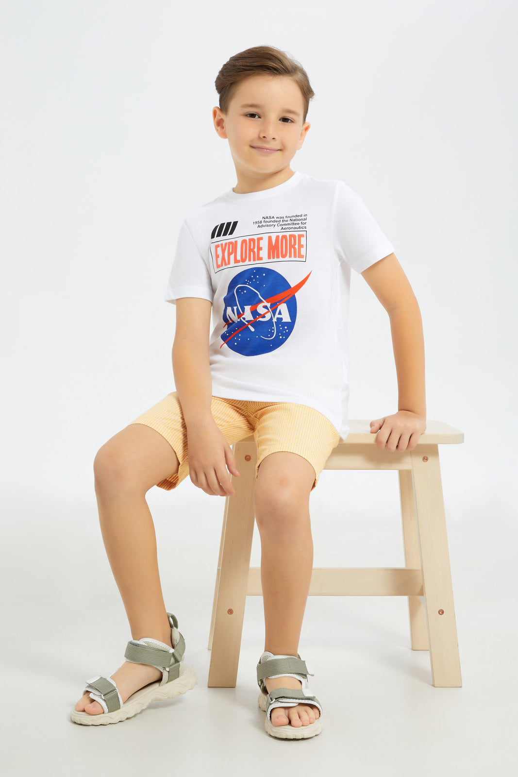 Redtag-Boys-White-Nasa-Short-Sleeve-T-Shirt-BOY-T-Shirts,-Category:T-Shirts,-CHA,-Colour:White,-Deals:New-In,-Filter:Boys-(2-to-8-Yrs),-H1:KWR,-H2:BOY,-H3:TSH,-H4:TSH,-New-In-BOY-APL,-Non-Sale,-S23C,-Season:S23C,-Section:Boys-(0-to-14Yrs)-Boys-2 to 8 Years