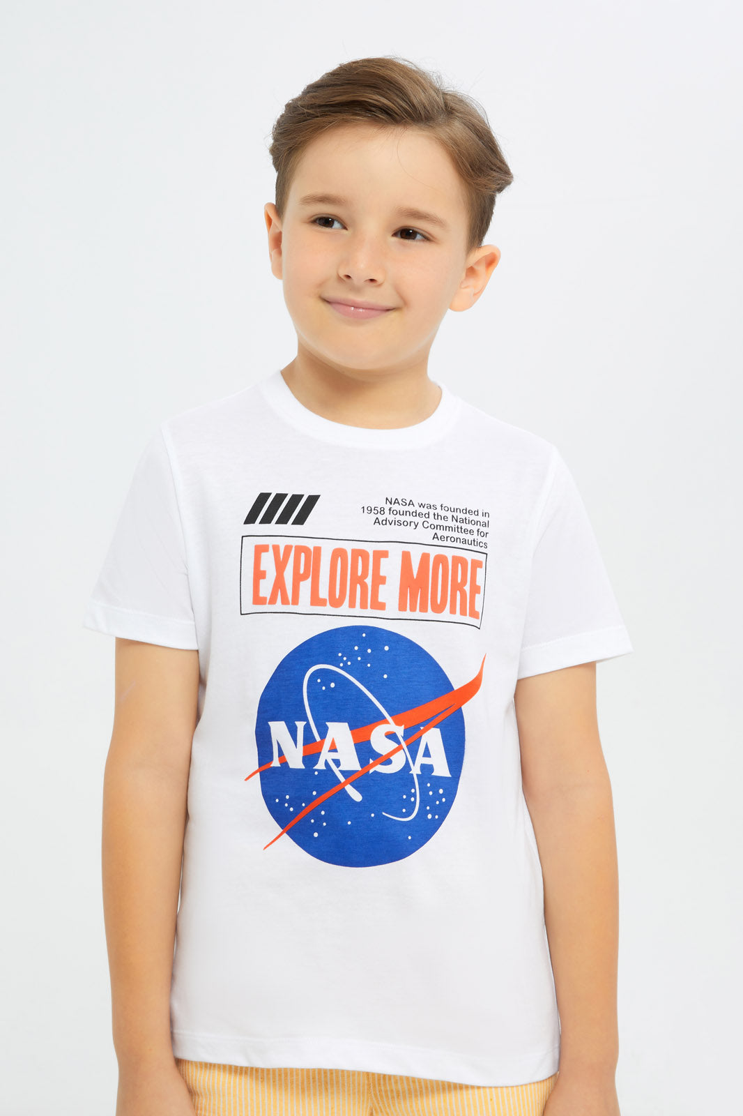 Redtag-Boys-White-Nasa-Short-Sleeve-T-Shirt-BOY-T-Shirts,-Category:T-Shirts,-CHA,-Colour:White,-Deals:New-In,-Filter:Boys-(2-to-8-Yrs),-H1:KWR,-H2:BOY,-H3:TSH,-H4:TSH,-New-In-BOY-APL,-Non-Sale,-S23C,-Season:S23C,-Section:Boys-(0-to-14Yrs)-Boys-2 to 8 Years