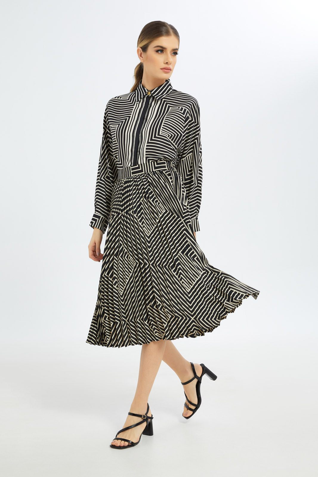 Redtag-Women-Assorted-Printed-Pleated-Skirt-Category:Skirts,-Colour:Assorted,-Deals:New-In,-Filter:Women's-Clothing,-H1:LWR,-H2:LDC,-H3:SKT,-H4:CAK,-LDC,-LDC-Skirts,-New-In-LDC-APL,-Non-Sale,-S23C,-Season:S23C,-Section:Women-Women's-